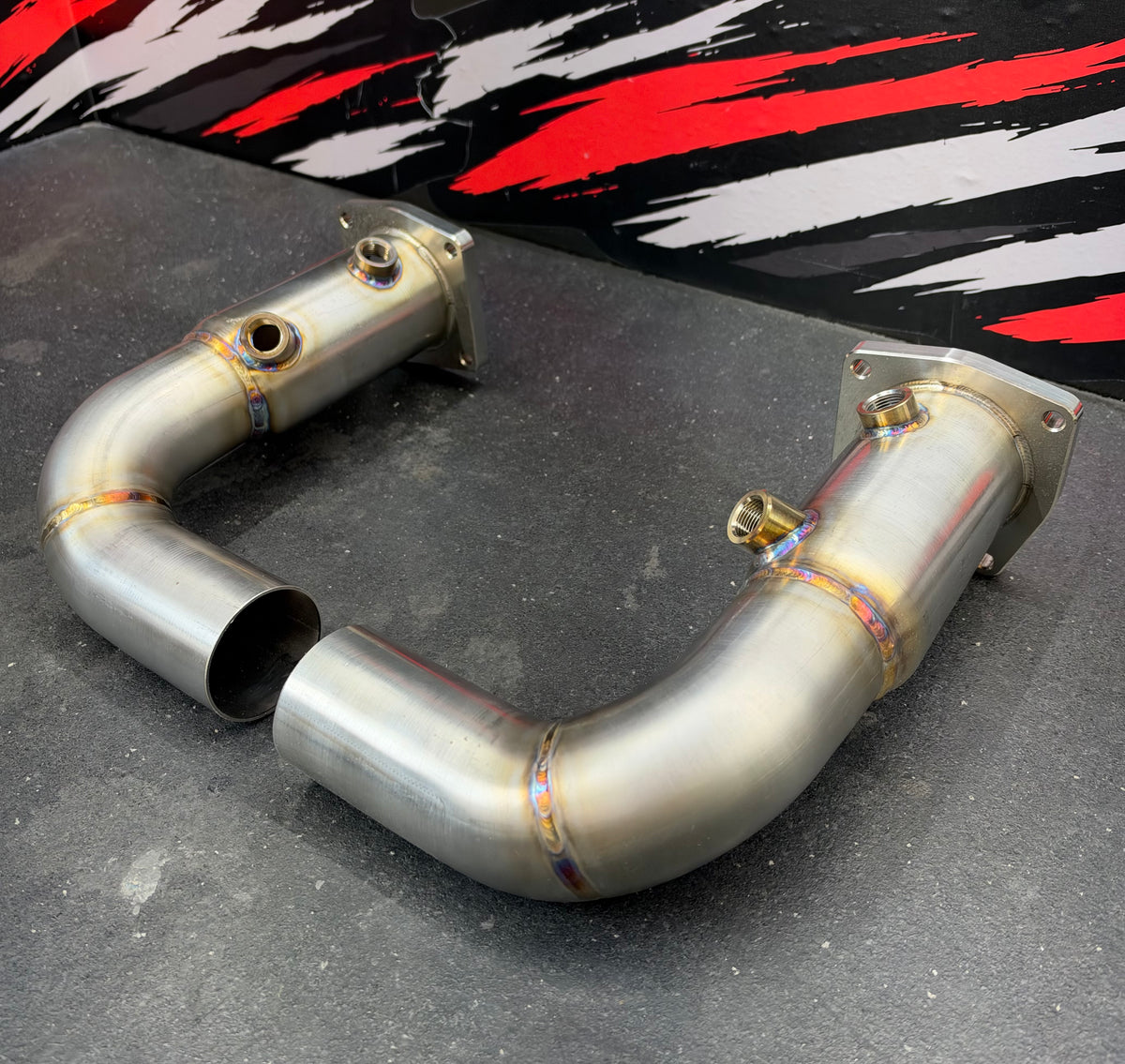 Tomlin Performance 991 Turbo downpipe pair, laid flat
