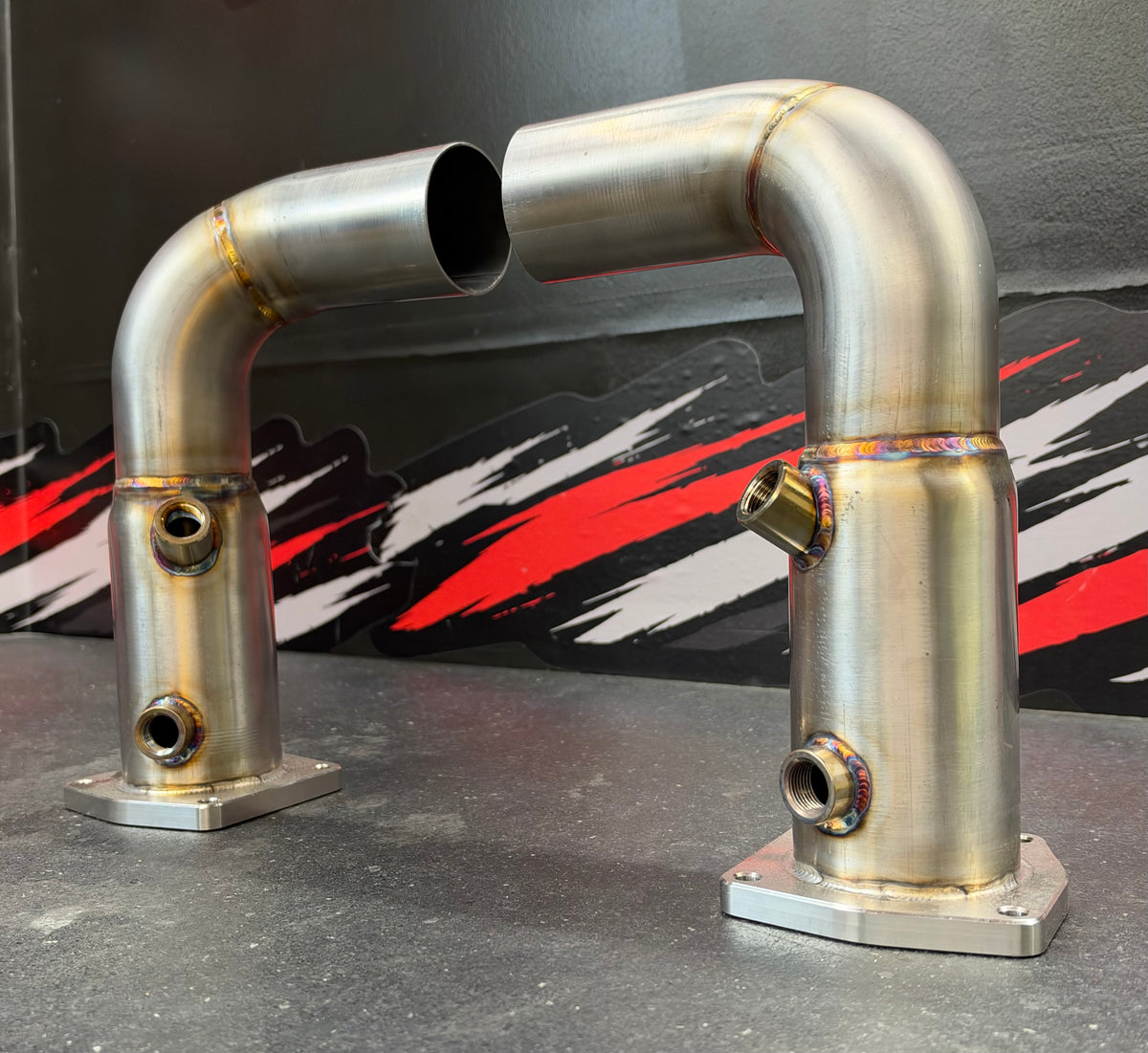 Tomlin Performance 991 Turbo downpipe pair, standing