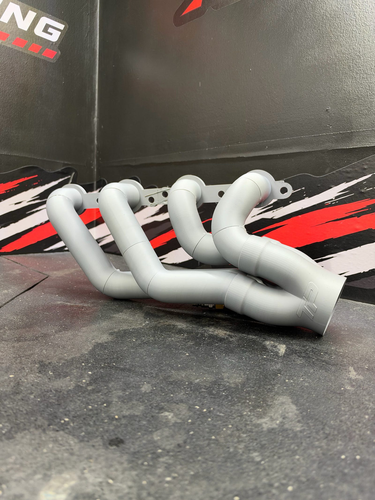 Gray 3D-printed plastic LS shorty header test-fit set with flanges